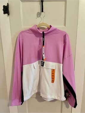 Ladies DKNY Pink Colorblock Pullover Top
New with tags XXL
